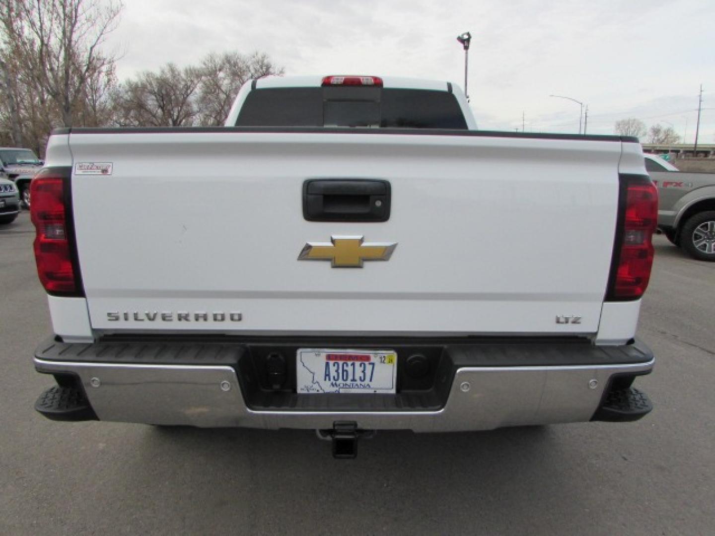 2015 White /Black Chevrolet Silverado 1500 LTZ Crew Cab Short Box 4WD (3GCUKSEJ7FG) with an 6.2L Ecotec gasoline engine, 6 speed automatic transmission, located at 4562 State Avenue, Billings, MT, 59101, (406) 896-9833, 45.769516, -108.526772 - Photo#2